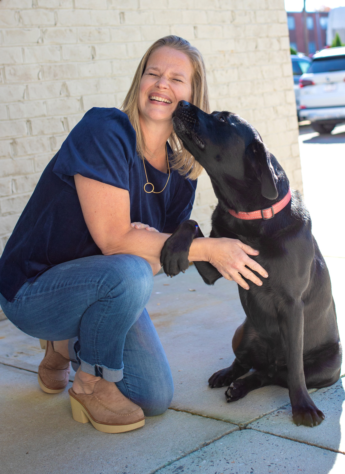 Amy Leubuscher with her dog Buck