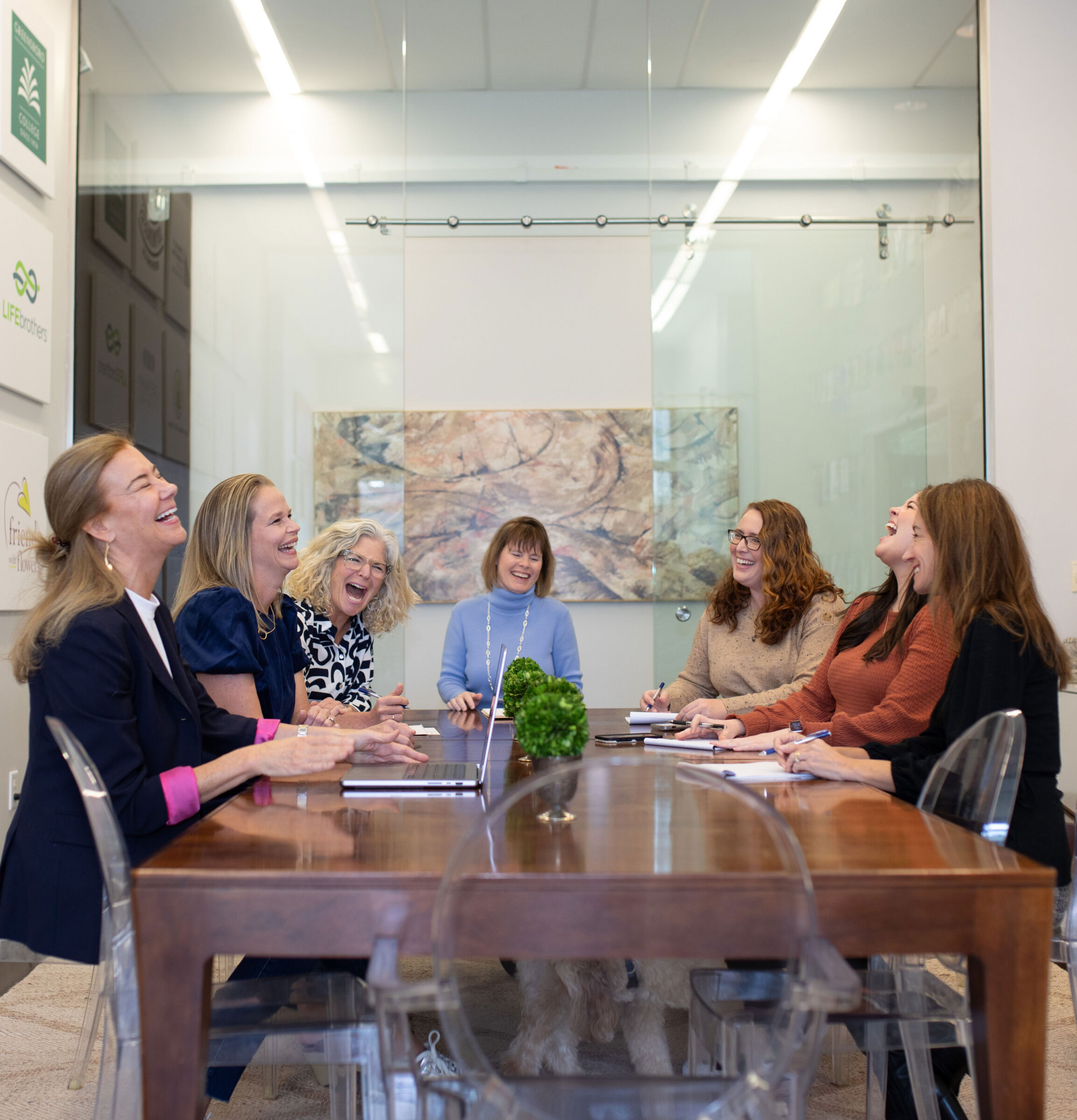 Boulton Creative team meeting in the conference room